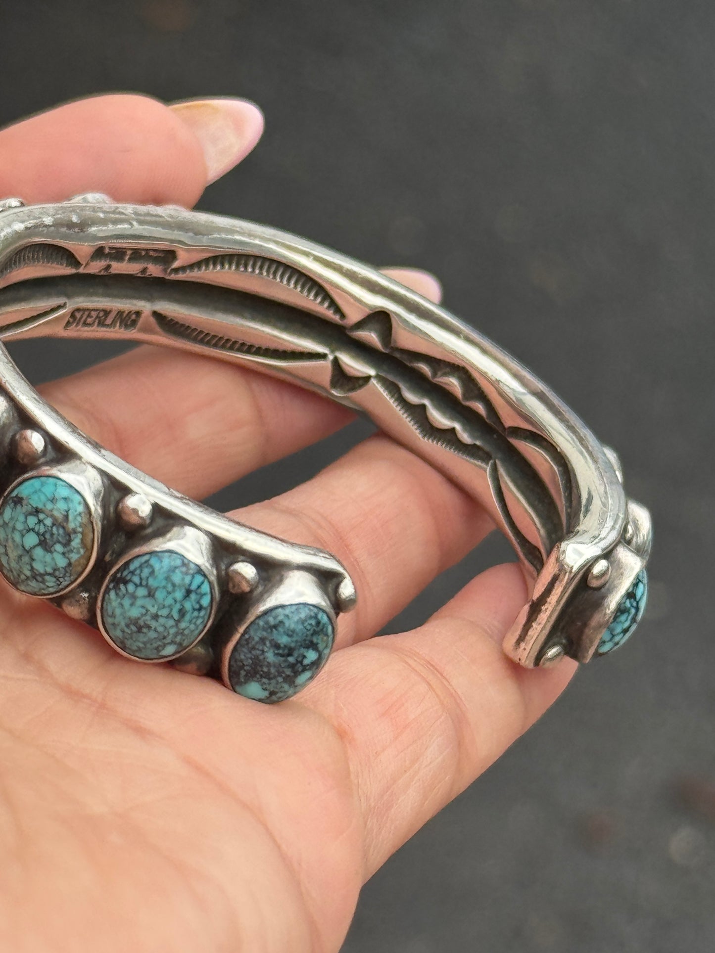 Orville Tsinnie 17 stone turquoise cuff