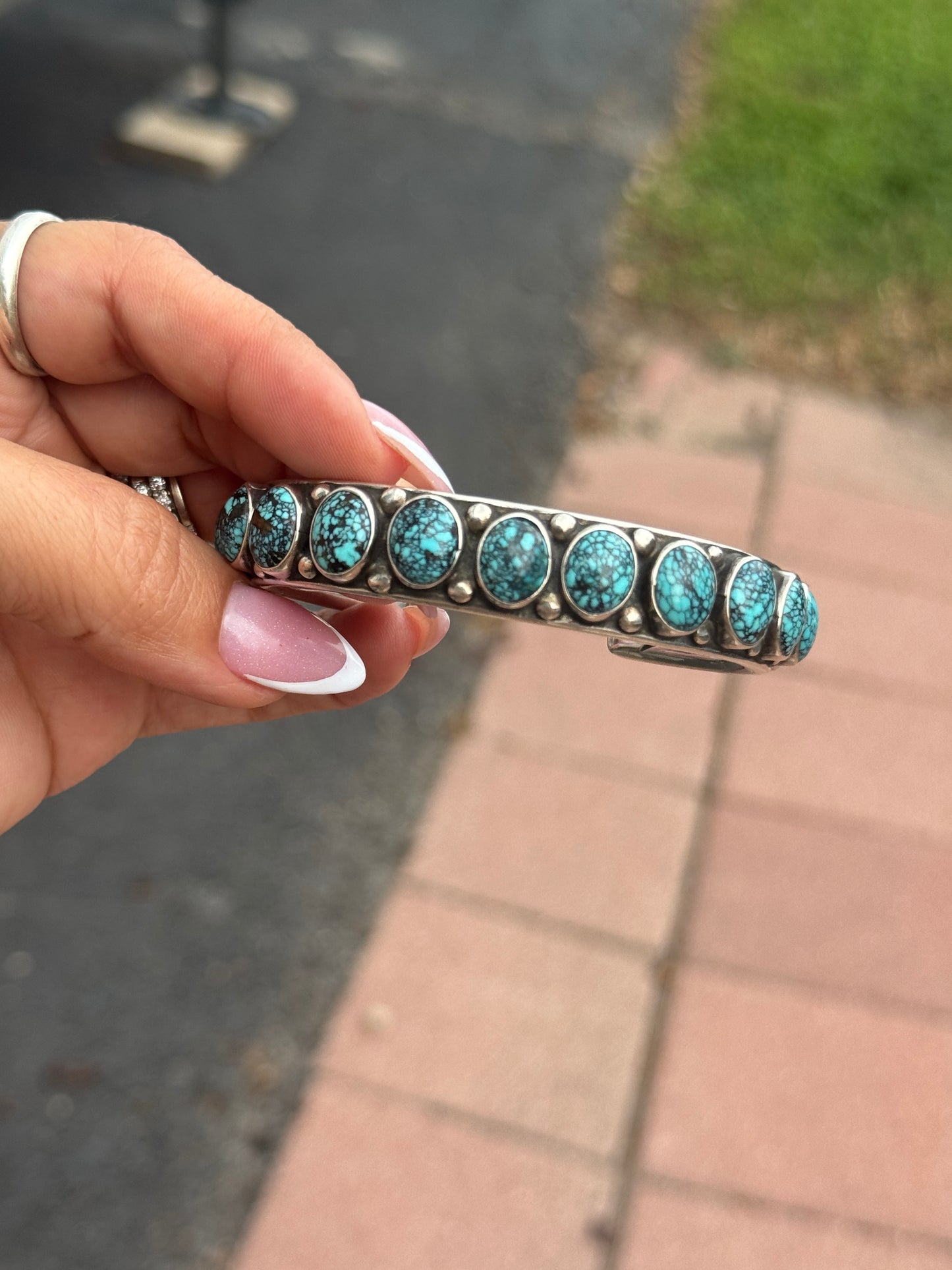 Orville Tsinnie 17 stone turquoise cuff