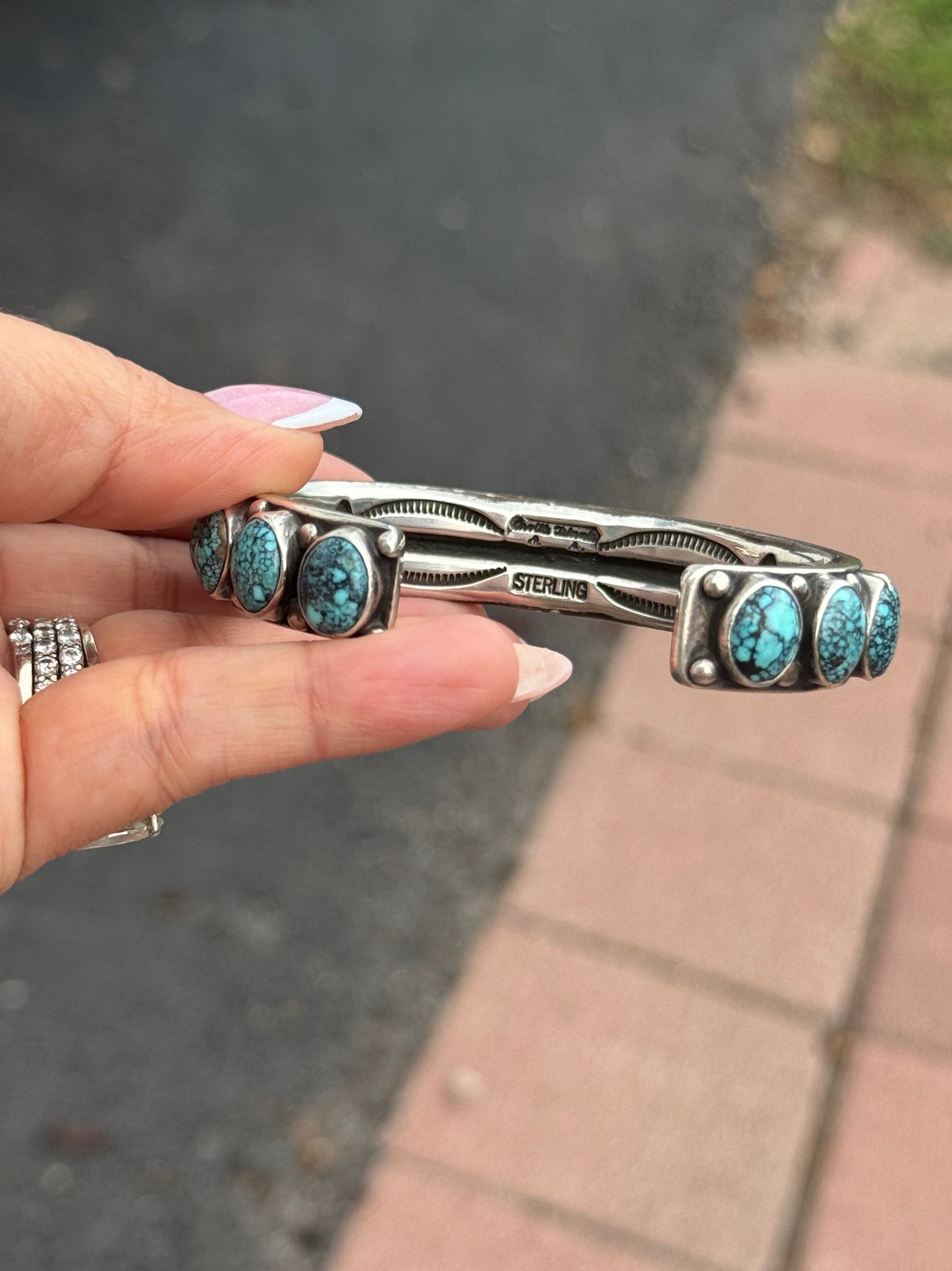 Orville Tsinnie 17 stone turquoise cuff