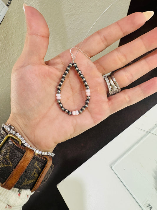 Pink conch earring teardrop