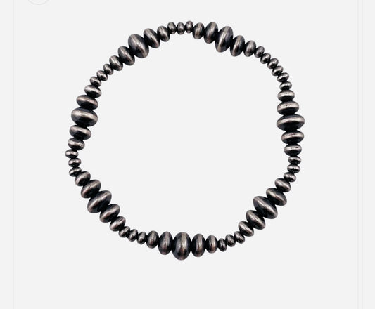 Graduated Saucer Stretch Bracelet