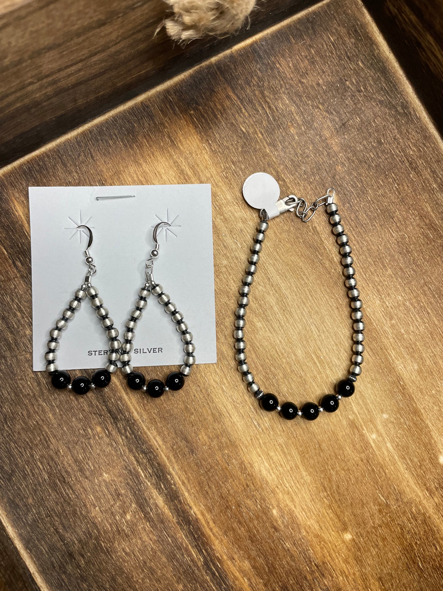 The Emmy Teardrop with Black onyx rounds